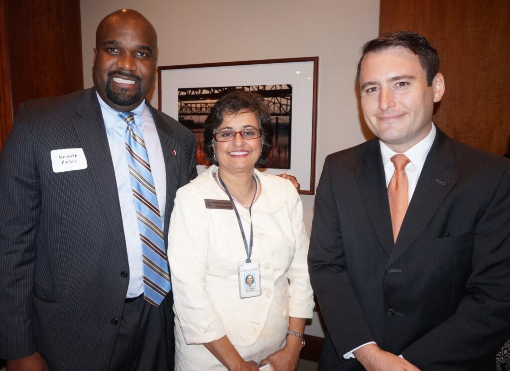 Former SWEL Student, Assistant U.S. Attorney Kenneth Parker (l) With Strauss Troy Attorneys Philomena Ashdown And Kris Brandenburg At SWEL Opening Reception