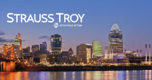Strauss Troy logo superimposed over Cincinnati skyline photo.